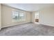 Large bedroom with neutral paint, plush carpet, and a window with blinds at 2356 W 165Th Pl, Broomfield, CO 80023