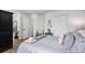 Comfortable bedroom features neutral carpet, and a decorative hat as an accent piece at 8691 Bluebunch Ct, Parker, CO 80134