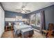 Bedroom featuring a queen size bed, and lots of natural light at 8691 Bluebunch Ct, Parker, CO 80134