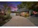 Charming home with a two-car garage and beautiful landscaped front yard and front porch at 8691 Bluebunch Ct, Parker, CO 80134