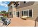 Relaxing back deck with comfortable seating, perfect for outdoor entertaining and leisure at 9169 Fox Fire Way, Highlands Ranch, CO 80129