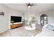 Spacious and well-lit living room featuring a modern design, sleek furniture, and hardwood floors at 9169 Fox Fire Way, Highlands Ranch, CO 80129