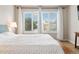 Bright and airy bedroom featuring plantation shutters for natural light and a comfortable setting at 9169 Fox Fire Way, Highlands Ranch, CO 80129