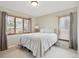 Bedroom with neutral carpet, natural light, and calm setting at 12752 W Asbury Pl, Lakewood, CO 80228