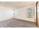 Inviting bedroom with carpet, ample natural light, and neutral tones for relaxation at 1351 S Cathay Ct # 102, Aurora, CO 80017