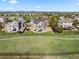 Aerial view showcasing the home's backyard and surrounding neighborhood at 12972 Uinta Ct, Thornton, CO 80602