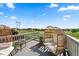 Back deck featuring comfortable wicker seating, perfect for enjoying peaceful outdoor views and a relaxing atmosphere at 12972 Uinta Ct, Thornton, CO 80602