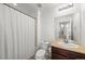 Bathroom with a shower/tub combo and sink with tan countertop at 12972 Uinta Ct, Thornton, CO 80602