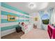 Colorful bedroom with decor and natural light from the window at 12972 Uinta Ct, Thornton, CO 80602