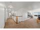 Bright hallway with lots of natural light and neutral finishes at 12972 Uinta Ct, Thornton, CO 80602