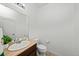 Well-lit powder room with a modern vanity, stylish fixtures, and a neutral color palette at 12972 Uinta Ct, Thornton, CO 80602
