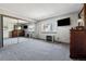 Spacious bedroom featuring mirrored closet doors, soft carpeting, and a window for natural light at 9805 Garrison Ct, Broomfield, CO 80021