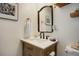 Stylish bathroom features a modern vanity, unique mirror, and elegant fixtures at 1050 N Lafayette St # 408, Denver, CO 80218