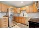 Well-equipped kitchen featuring stainless steel appliances, bright cabinetry, and ample counter space at 1050 N Lafayette St # 408, Denver, CO 80218