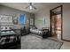 Shared bedroom featuring two beds, modern decor, and plenty of space at 25312 E Glasgow Pl, Aurora, CO 80016