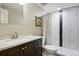 Stylish bathroom showcasing modern fixtures, a decorative mirror, and a shower with elegant marble tiling at 11007 Meadowvale Cir, Highlands Ranch, CO 80130