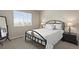 Cozy bedroom with a large window, allowing for plenty of natural light and a comfortable atmosphere at 11007 Meadowvale Cir, Highlands Ranch, CO 80130