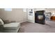 Relaxing bedroom with a fireplace, built-in shelving, and a comfortable chaise lounge at 11007 Meadowvale Cir, Highlands Ranch, CO 80130
