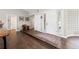 Welcoming foyer showcasing hardwood floors, natural light, and access to other rooms at 2235 Stonecrop Way, Golden, CO 80401