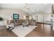 Inviting living room features vaulted ceilings, fireplace, and comfortable seating arrangement at 2235 Stonecrop Way, Golden, CO 80401