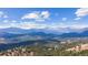Enjoy stunning mountain views from this home, nestled among the trees in the hills at 2235 Stonecrop Way, Golden, CO 80401