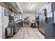 Functional workshop with storage cabinets, peg board, and plenty of counter space at 2235 Stonecrop Way, Golden, CO 80401