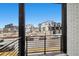 A clear view of the surrounding neighborhood from an iron-railed balcony at 1727 W 166Th Ave, Broomfield, CO 80023