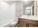 Bathroom with a single sink vanity, white subway tile backsplash, and modern fixtures at 1727 W 166Th Ave, Broomfield, CO 80023