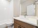 Well-lit bathroom featuring a vanity with solid surface counters, a stylish faucet, and a shower-tub combination at 1727 W 166Th Ave, Broomfield, CO 80023