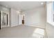 Spacious bedroom with neutral carpet, recessed lighting, and bright windows with natural light at 1727 W 166Th Ave, Broomfield, CO 80023