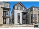 Charming exterior of a two-story home with black and white paint, and a small front yard at 1727 W 166Th Ave, Broomfield, CO 80023