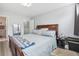 Cozy bedroom featuring natural light and a comfortable bed at 11827 Brook Rd, Golden, CO 80403