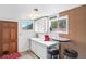 Quaint kitchenette features a coffee bar area and natural light at 11827 Brook Rd, Golden, CO 80403