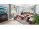 Comfortable living room with large windows, neutral tones, and a cozy seating arrangement at 11827 Brook Rd, Golden, CO 80403