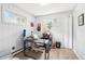 Bright office space featuring ample natural light and neutral paint at 11827 Brook Rd, Golden, CO 80403