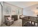 Cozy bedroom with soft natural light, neutral colors, and comfortable furniture at 2951 W Riverwalk Cir # N, Littleton, CO 80123