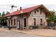 Charming historic building with stone facade and red roof in the Littleton area at 2951 W Riverwalk Cir # N, Littleton, CO 80123