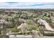 Sprawling estate featuring mature trees, gardens, and a long driveway leading to a beautiful main house at 4682 S Franklin St, Englewood, CO 80113