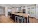 Bright and airy kitchen with a center island, ample counter space, and modern appliances at 4682 S Franklin St, Englewood, CO 80113