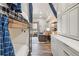 Bedroom featuring bunk beds, wood floors, a reading chair, and plenty of cabinet storage at 645 S Park Ave # 302, Breckenridge, CO 80424