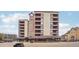 Exterior of building with clock tower and pedestrian area at 645 S Park Ave # 302, Breckenridge, CO 80424