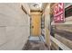 Hallway with tile flooring and light wood doors that features fun design details at 645 S Park Ave # 302, Breckenridge, CO 80424