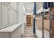 Hallway with bunk beds, cabinet storage, wood floors and an accent wall at 645 S Park Ave # 302, Breckenridge, CO 80424