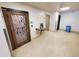 Hallway with water fountain and entryways for the sauna and steam room at 645 S Park Ave # 302, Breckenridge, CO 80424
