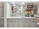 Kitchenette featuring grey cabinets, stainless steel backsplash, and a microwave at 645 S Park Ave # 302, Breckenridge, CO 80424