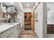 Efficient kitchenette with sink, microwave, and storage beneath a bright countertop, offering space-saving functionality at 645 S Park Ave # 302, Breckenridge, CO 80424