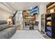 Inviting living room space with booth dining, sofa and a mounted TV at 645 S Park Ave # 302, Breckenridge, CO 80424