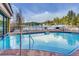 Inviting outdoor pool with stunning views of the surrounding forest and mountain landscape at 645 S Park Ave # 302, Breckenridge, CO 80424
