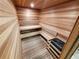 Bright sauna with wood interior, built-in bench seating, and modern fixtures at 645 S Park Ave # 302, Breckenridge, CO 80424