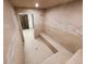 Bright steam room with tiled walls, built-in bench seating, and modern fixtures at 645 S Park Ave # 302, Breckenridge, CO 80424